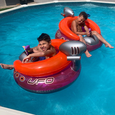 This Inflatable Pool Tube Has A Water Gun Attached For Some Summer Competition
