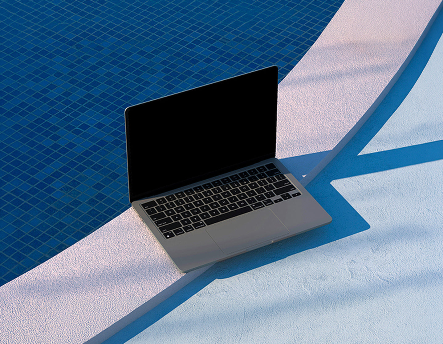 Laptop on a blue and white surface