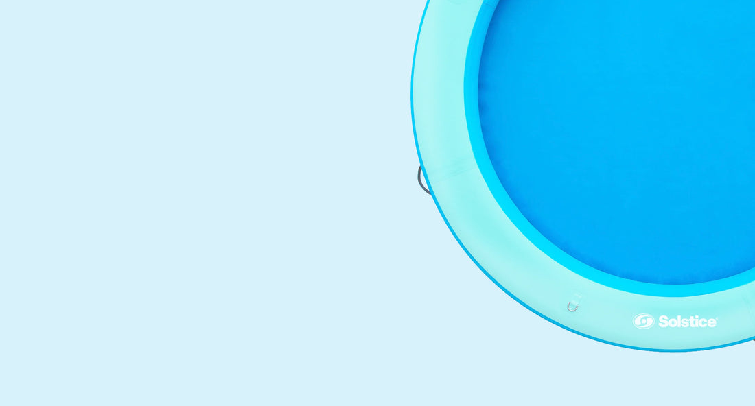 Partial view of a blue float with a light blue background